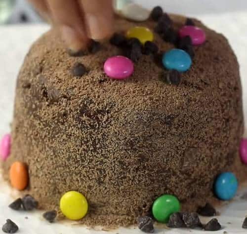 Gems and chocolate chips in cake