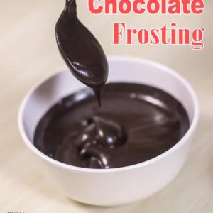Chocolate Frosting Using Cocoa Powder on a white bowl kept on a wooden surface