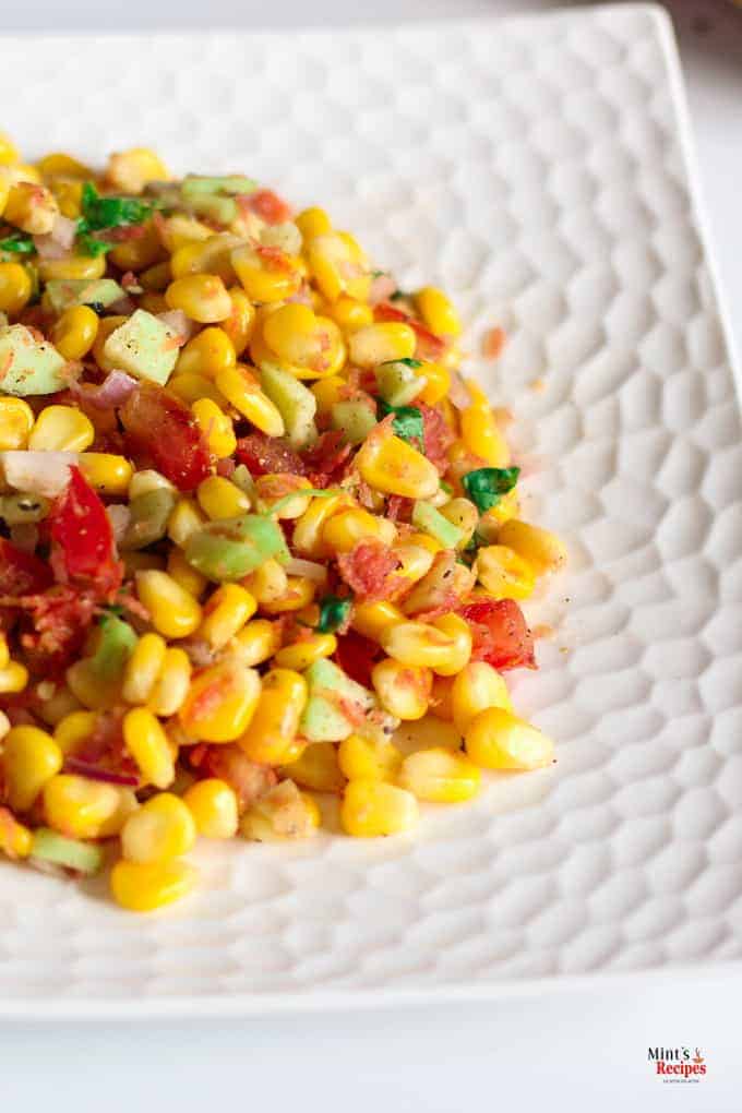 Corn Salad palced on white plate