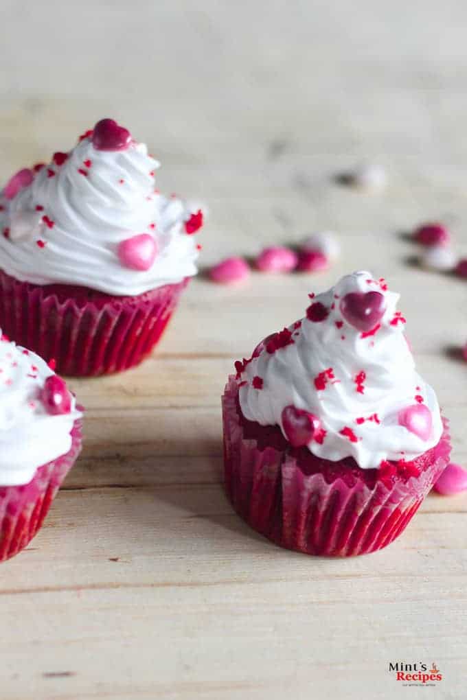 Red Velvet Cup Cake with wonderful white cream cheese icing layering it