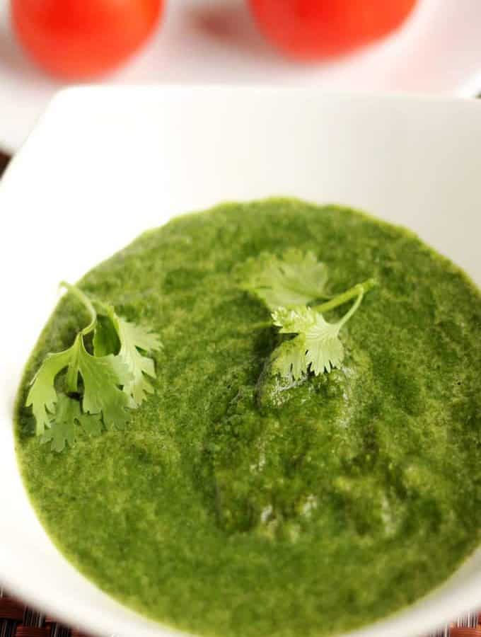 Coriander chutney on a white bowl