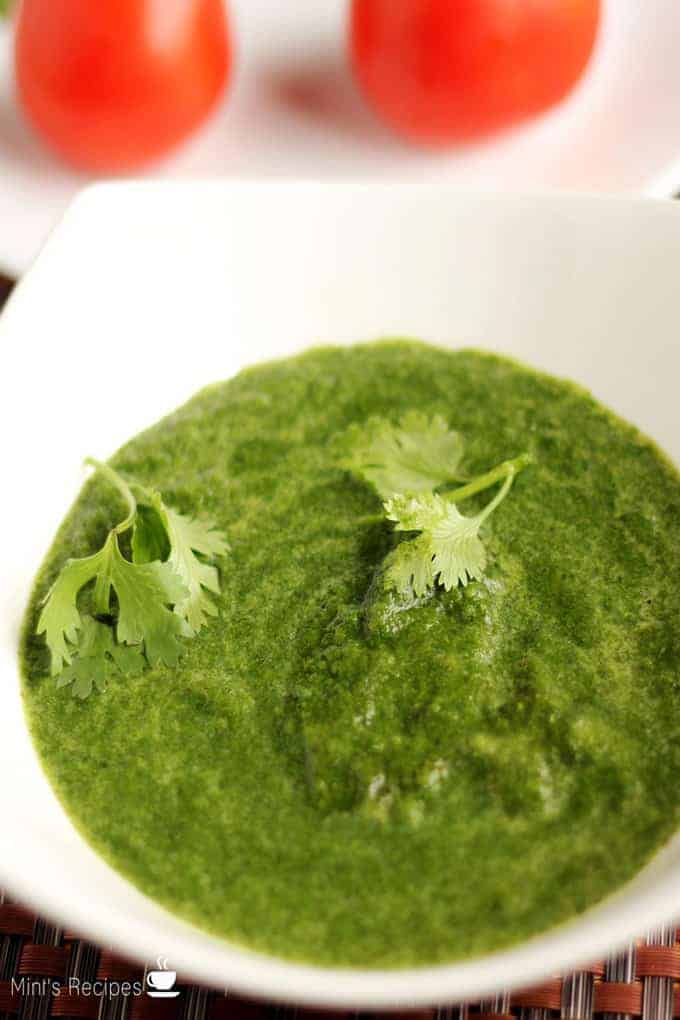 Coriander chutney on a white bowl 