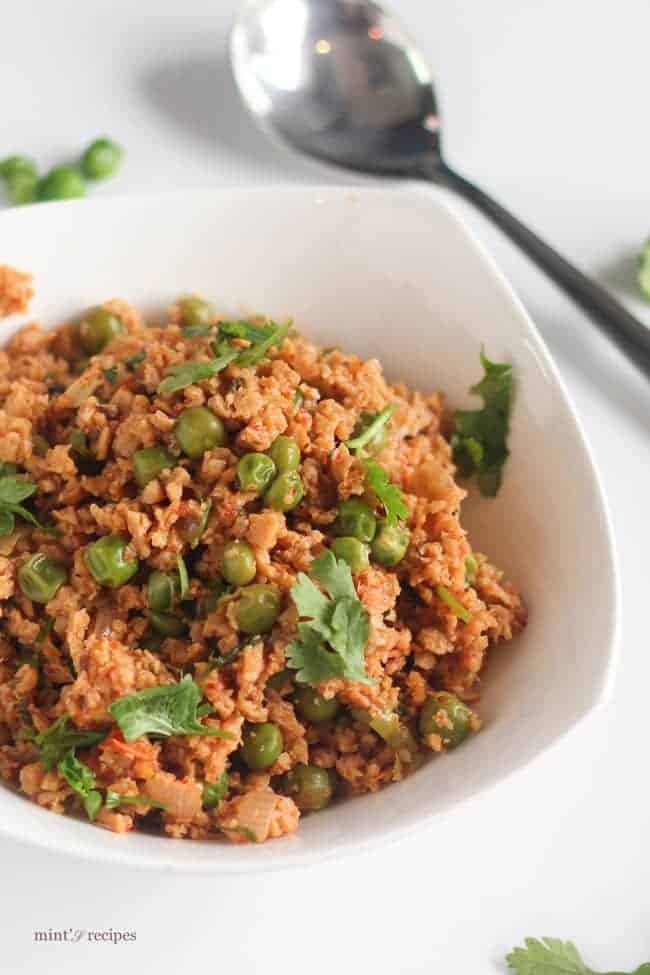 Dry Soya Peas on a white bowl with garnish with coriander leaves