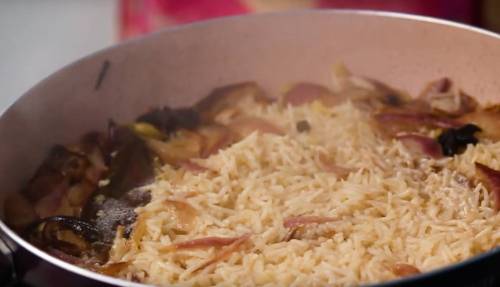 Grease ghee in pan