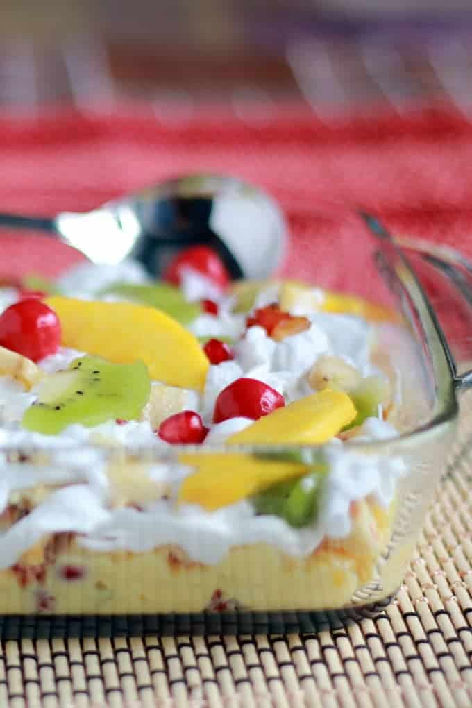 Eggless Fruit Trifle pudding on a square borosil bowl 