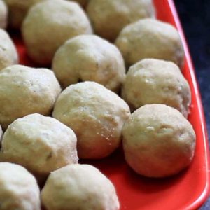 Gond-ke-laddu on a red plate