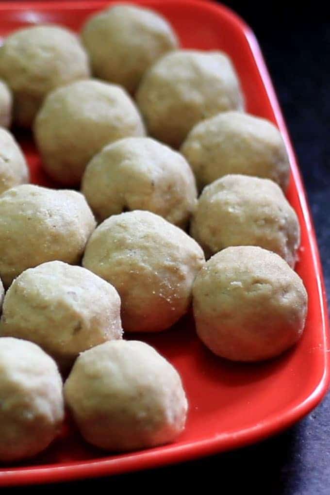 Gond-ke-laddu on a red plate 