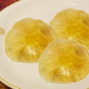 kuttu ki puri on a white plate