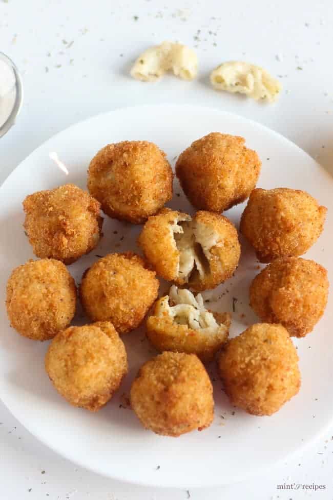 Macaroni cheese balls on a white plate
