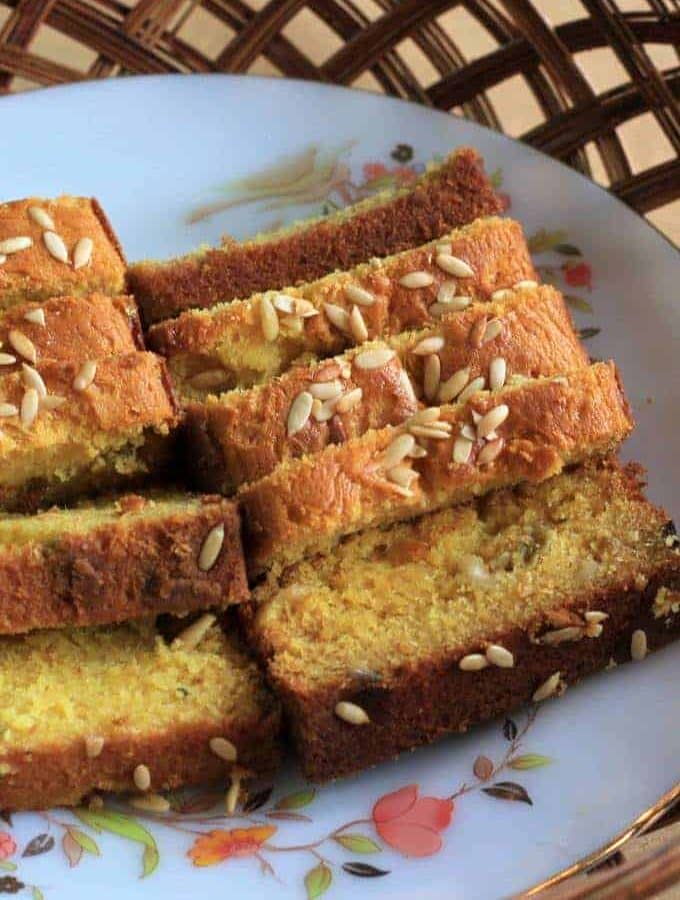 Eggless Mango custard cake slices on a floural printed plate