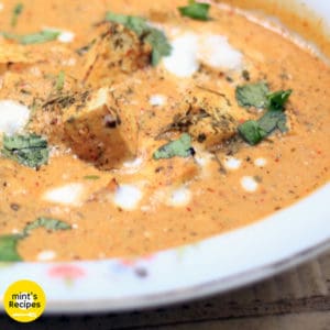 Paneer butter masala on a floural printed plate