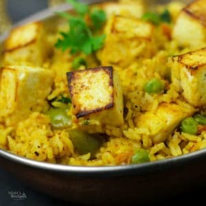 Paneer Butter Masala with peas and coriander leaves
