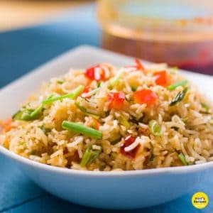 Schezwan Fried Rice Recipe served with vegetables