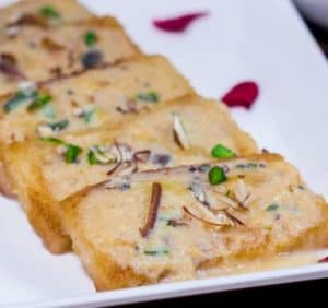 Shahi Tukda Recipe served with chopped almonds and pistachios