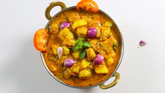 Potato Soyabean Ki Sabzi with Onion and Tomato toppings