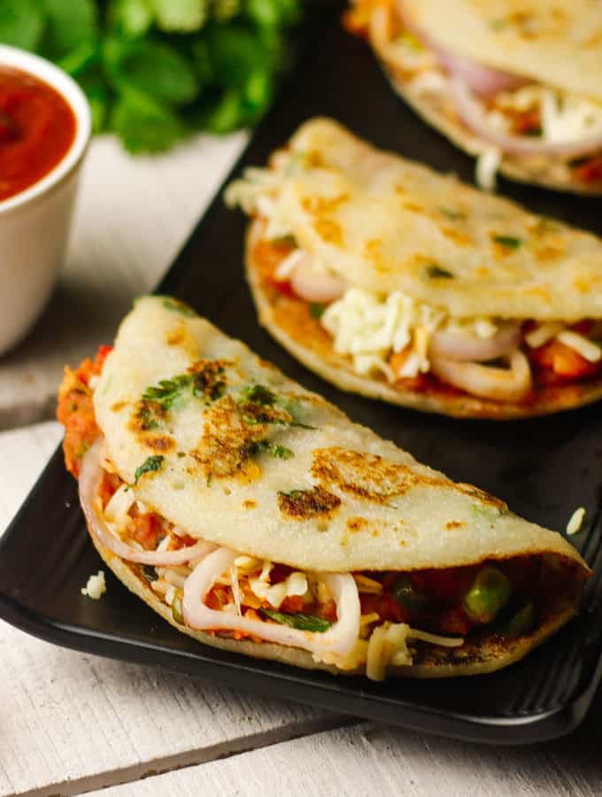 Suji Tacos on a black plate