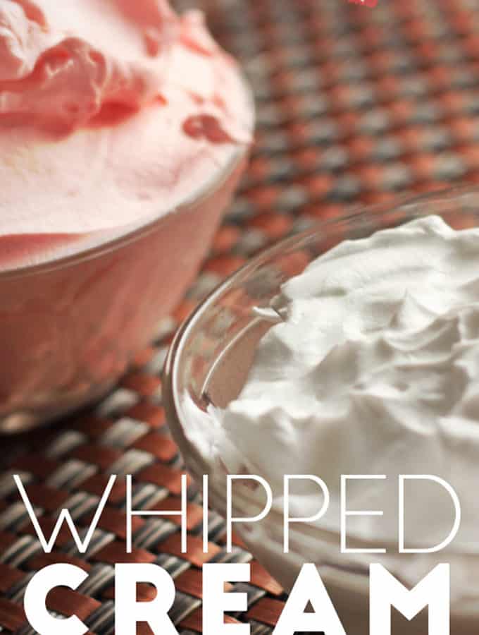 Whipped cream on a glass bowl