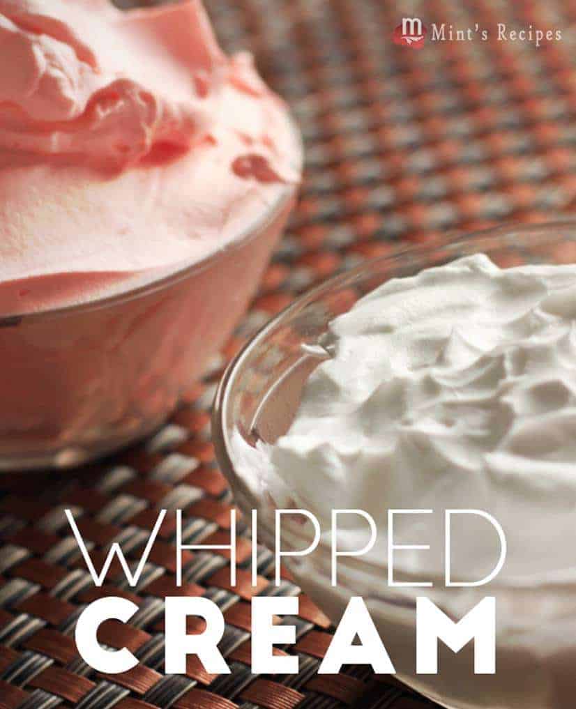 Whipped cream on a glass bowl 